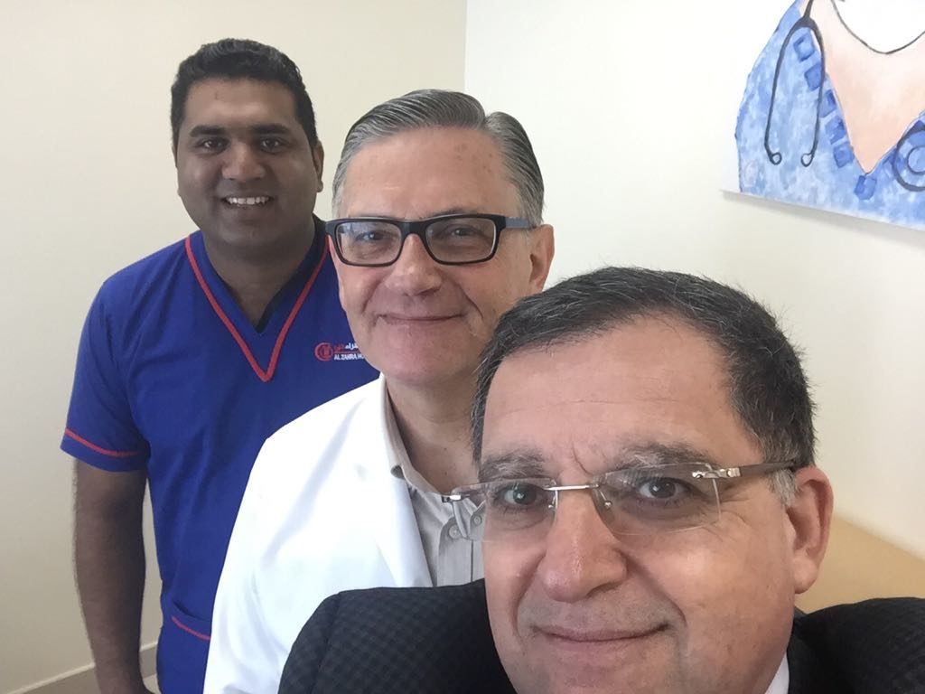 With Dr Riyadh chair of surgical services Alzahra Center together we work symbol of Alzahra Team November 2017